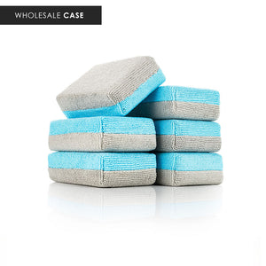 An image advertising a wholesale case of a six pack of the new ULTRA No-Soak Coating Applicator from the Rag Company. These microfiber sponges feature ice grey on one side and ultra blue on the other. These sponges also have a special liner that prevents the coating from soaking through the microfiber and into the sponge.
