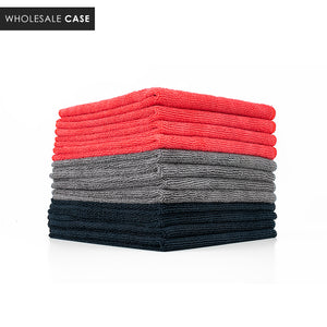 A stack of black, grey, and red towels on a white background with the text 'Wholesale Case'.