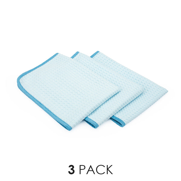 A picture of the 3 pack of Dry Me A River waffle weave microfiber towels from The Rag Company in light blue
