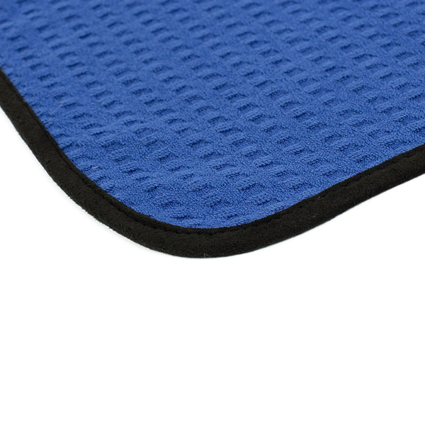 A picture of single Dry Me A River waffle weave microfiber towels from The Rag Company in royal blue with a black border