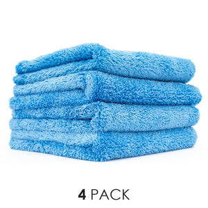 A picture of a 4-pack of Eagle Edgeless towels from The Rag Company in a blue color.