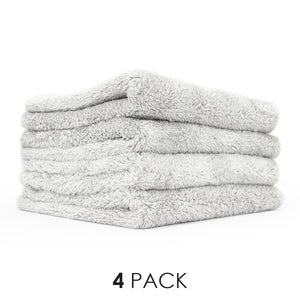 A picture of a 4-pack of Eagle Edgeless towels from The Rag Company in Ice Grey