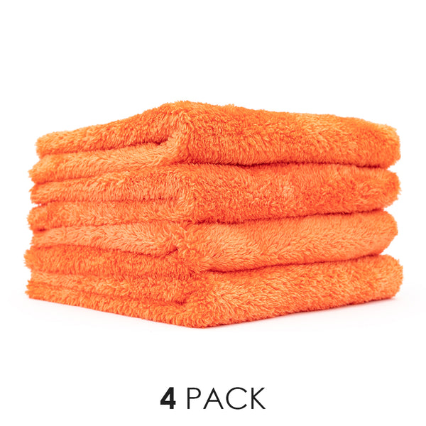 A picture of a 4-pack of Orange Eagle Edgeless towels from The Rag Company