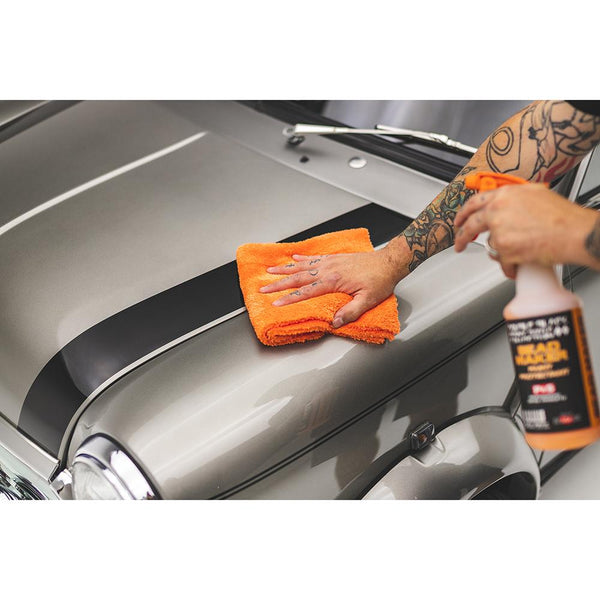 Using an Orange Eagle Edgeless 500 towel from The Rag Company to dry the hood of a grey Mini Cooper after spraying P&S Bead Maker.