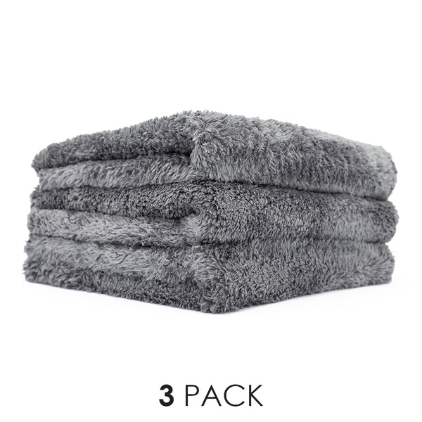 A 3 pack of grey Eagle Edgeless 600 16x16 microfiber towels from The Rag Company.