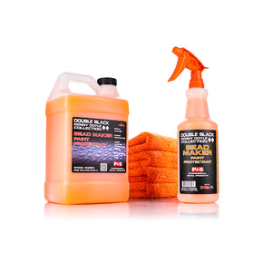 A jug and spray bottle of P&S Bead Maker with a stack of orange towels on a white background.