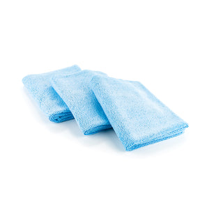 Three light blue towels on a white background.