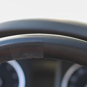 A before and after using P & S Terminator on a steering wheel. The left side has pours filled with gunk and the right side has tiny pours.