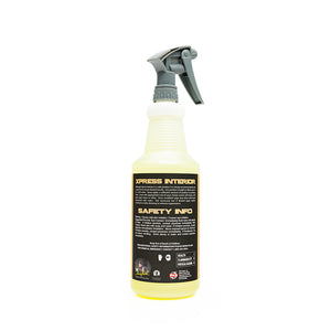 The back of a spray bottle of P & S Xpress Interior on a white abckground.
