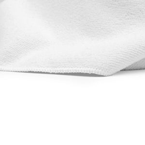The Rag Company Spa and Workout white towel close up on a white background.