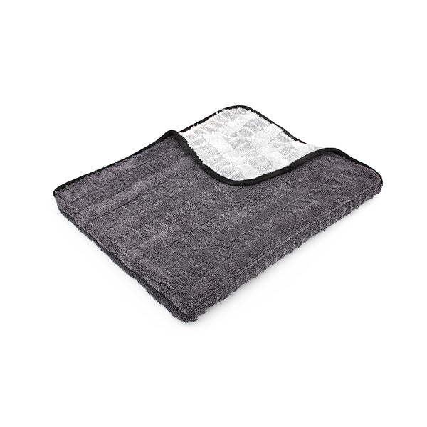 An image of a single 30 inch by 36 inch Gauntlet Towel from The Rag Company. These towels are Ice Grey on One side and Gauntlet Grey on the other with a scratcheless suede edge banding them together